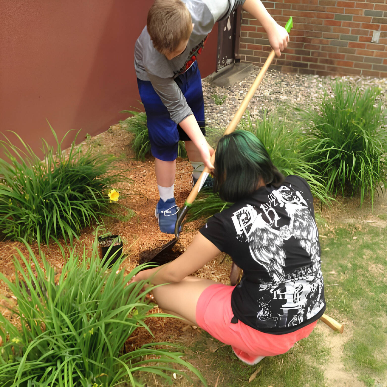 Two Students Gardening at All Saints
